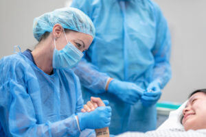 Critical care team with patient that is about to undergo surgery.