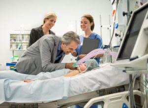 Family visiting their daughter in a critical care settings.